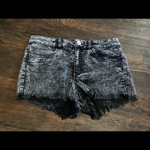 Frayed black jean shorts